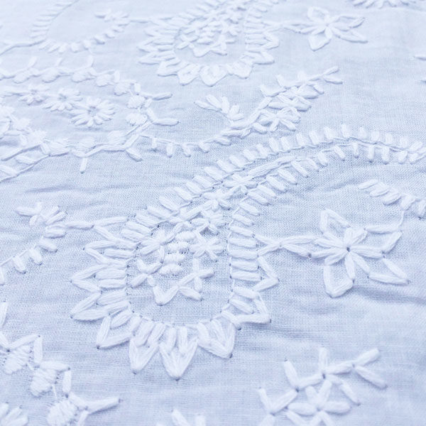 White embroidered cotton fabric